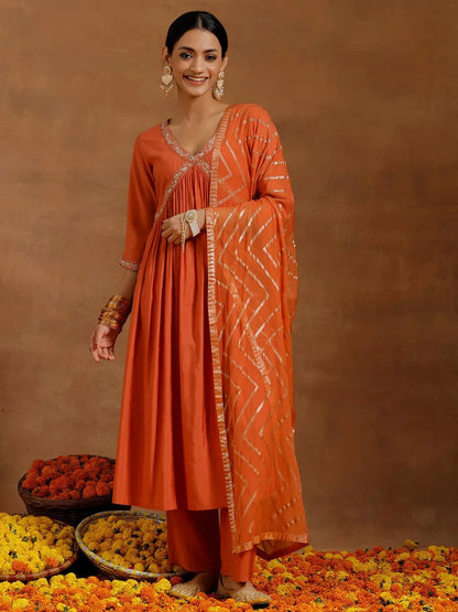 Gerua Rust Solid Silk Blend A-Line Kurta With Trousers & Dupatta